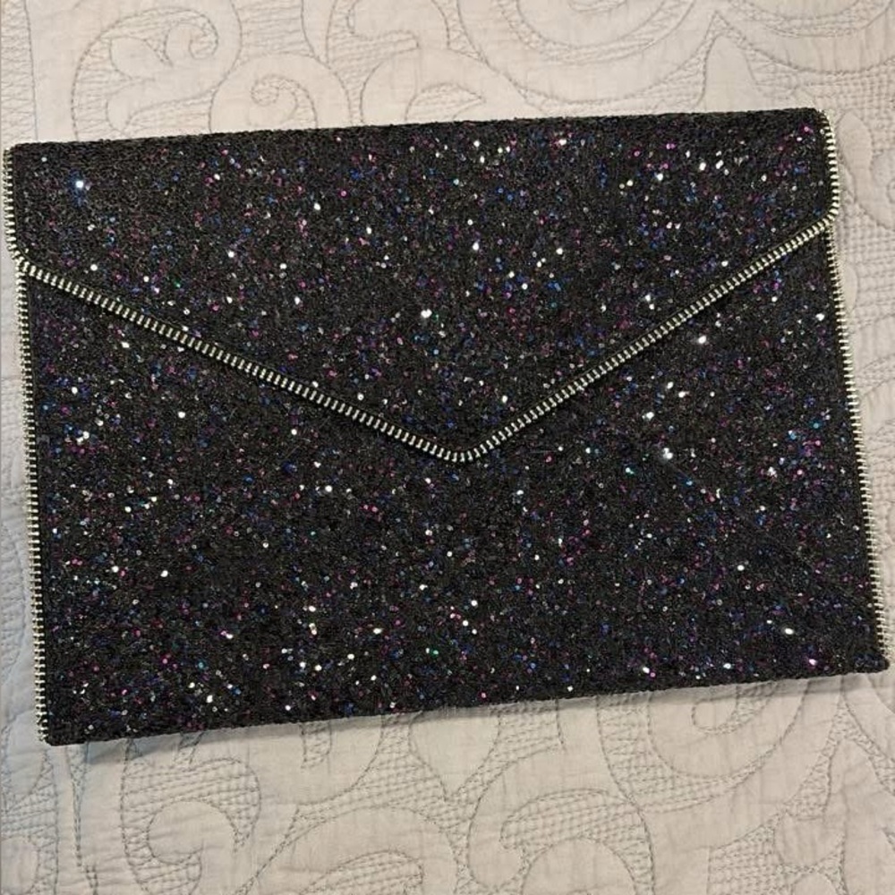 Like New Rebecca Minkoff Leo Envelope Clutch in blue, purple and black glitter.